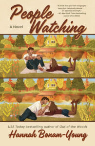 Book cover of People Watching by Hannah Bonam-Young featuring an illustrated couple lying on a blanket in an autumn field, laughing and sharing a tender moment.